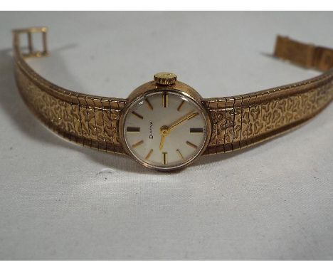 A lady's 9 carat gold Bulova wristwatch, case weight 23g, assay marks to the case for London
 1967, with 17-jewel manual wind