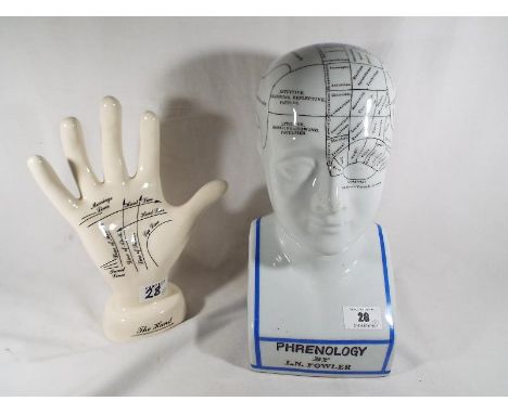 A ceramic Phrenology educational head and hand