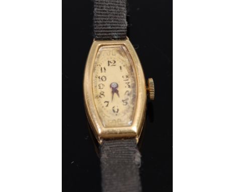 A Swiss Art Deco 18ct gold cased ladies tank watch by the Geneva Clock Company, having manual wind movement, dia. 1.4cm