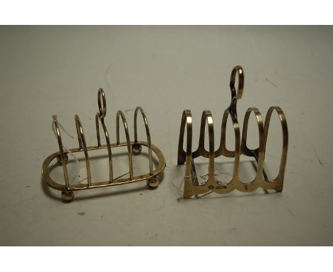 A George V silver four division toast rack by William Hutton & Sons Ltd, Sheffield, 1926, together with one other George V si