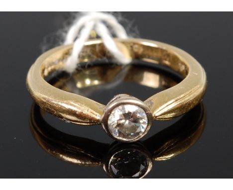 An 18ct gold diamond solitaire ring, the illusion set brilliant weighing approx 0.25ct, gross weight 4g, size K/L    Conditio