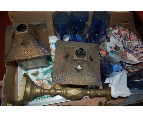 A box of miscellaneous items to include; pair of hammered ceiling light pendants, turned brass candlesticks, glassware etc