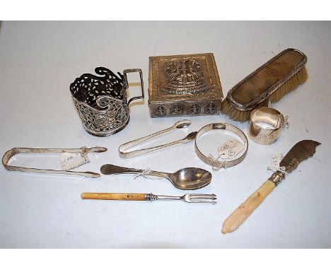 A small collection of miscellaneous items, to include; silver backed brush, silver bangle, white metal table cigarette box et