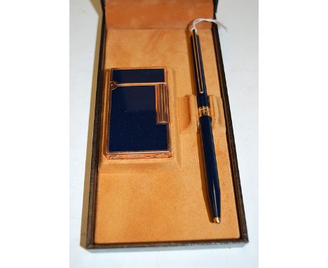 A Du Pont of Paris Chinese lacquered pocket cigarette lighter with matching ball pen in fitted case