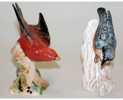 A Beswick figure of a Tanager, model No. 928, impressed Beswick England verso; together with a Goebel model of a Nuthatch, pr