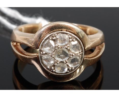A heavy gilt metal and rough cut diamond set cluster ring, having twin shank, size V 