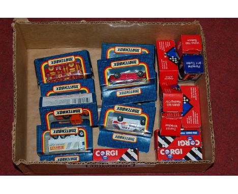 A small box of Matchbox and Corgi model cars