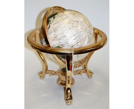 A reproduction brass framed and hardstone inset table top terrestrial globe