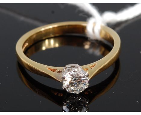 An 18ct gold diamond solitaire ring, the claw set brilliant weighing approx. 0.25 carat, 2.8g, size N