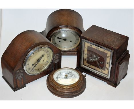 An Art Deco Enfield oak cased mantel clock, having silvered dial with Roman numerals, eight day movement striking on a gong; 