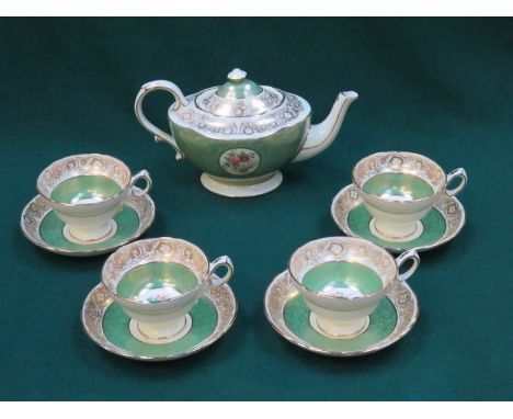 HAMMERSLEY & CO GILDED AND FLORAL DECORATED CERAMIC TEAPOT AND FOUR CUPS AND SAUCERS