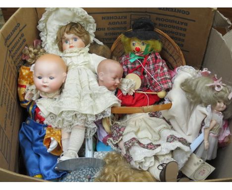 TWO PORCELAIN DOLL HEADS PLUS QUANTITY OF VARIOUS SOUVENIR DOLLS AND PELHAM PUPPET 