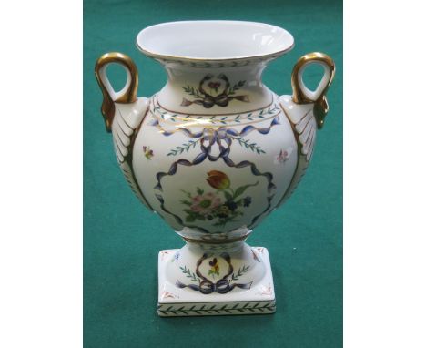 HANDPAINTED AND GILDED FLORAL DECORATED TWO HANDLED CERAMIC VASE, APPROXIMATELY 29cm HIGH 