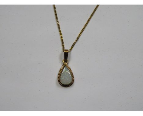 OPAL TEARDROP PENDANT ON 9ct GOLD CHAIN 