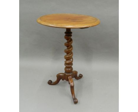 A Victorian mahogany barley twist tripod table. 47 cm diameter.