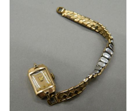 A Smiths 9 ct gold cased ladies wristwatch, inscribed to reverse Thos. Lebon &amp; Sons Limited, Presented for Long Service, 