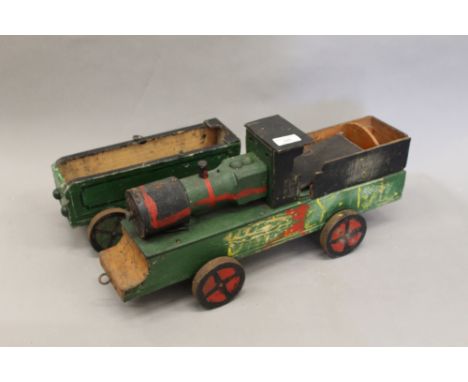 A vintage scratch built wooden train. The engine 53 cm long.