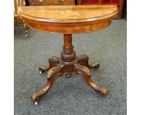 A Victorian burr walnut demi-lune card table. 90 cm wide.