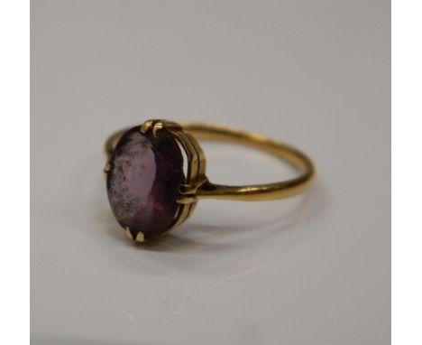 A 9 ct gold amethyst set ring. Ring size H/I (1.3 grammes total weight)