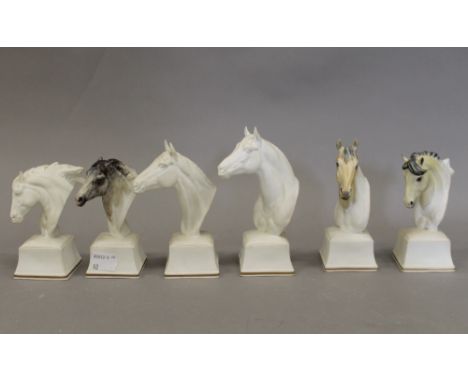 Six Royal Worcester porcelain racehorse busts. The largest 14 cm high.