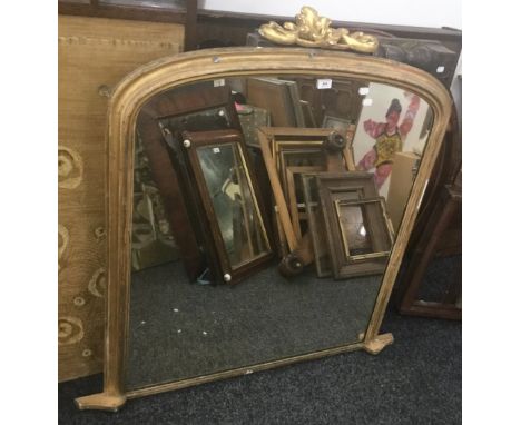 A Victorian gilt framed overmantle mirror. 115 cm wide, 122 cm high overall (106.5 high excluding finial).
