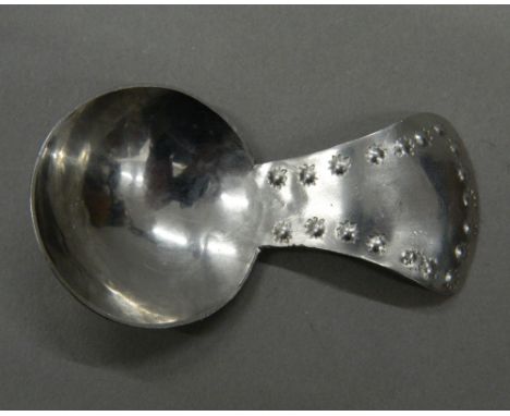 A Keswick Industrial School of Art caddy spoon.  7 cm long.