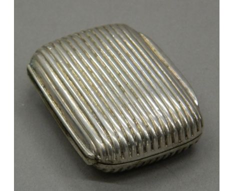 A 19th century silver plated snuff box.  5.5 cm wide.