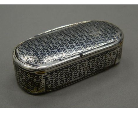 A Continental silver and niello snuff box.  7.5 cm wide (48.4 grammes).