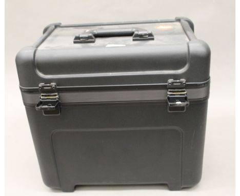 A Leica slide projector, cased