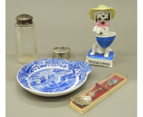 A silver napkin ring, a silver topped caster, a Spode porcelain dish, a porcelain dog and a Dutch spoon.  Porcelain dog 13 cm