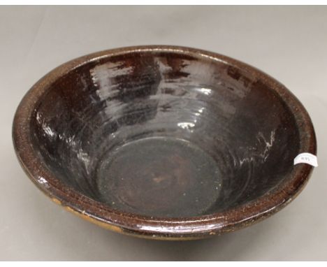 A large ceramic dairy bowl. 47 cm diameter.