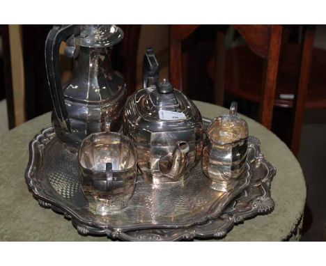 GROUP OF PLATED ITEMSincluding a silver plated four piece tea service and two trays 