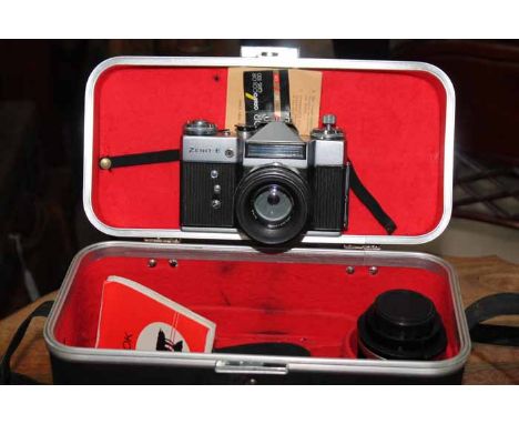 PAIR OF BARR & STROUD BINOCULARSalong with cameras and accessories, including a Zenit-E camera in box with spare lens, Balda 