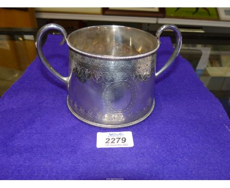A large Silver sugar basin with two handles having a crest to front of a bird with 'Sperandum', London, possibly 1896, makers