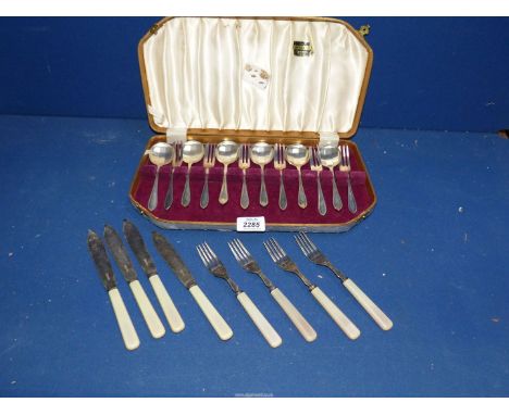 A cased Viners dessert fork and spoon set, together with four pairs of fish knives and forks.