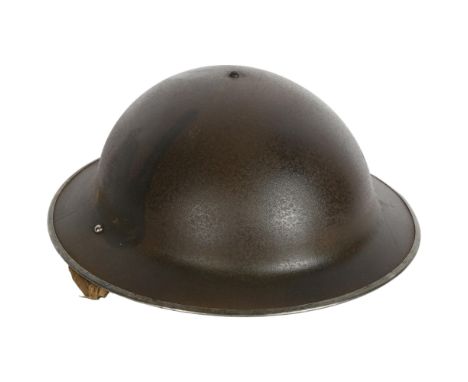 A British Army Mk II Brodie helmet, with leather inset 