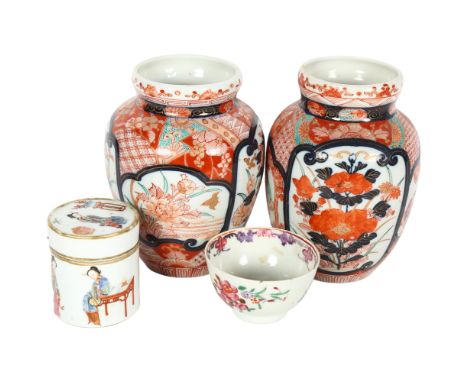 An 18th century Chinese tea bowl, with hand painted floral decoration, H4.5cm, and a 19th century Chinese cylindrical box and