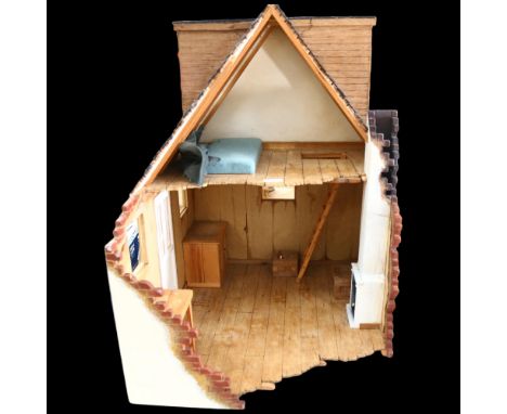A hand-built model of a partially demolished house, with some furniture and ladder, H70cm 