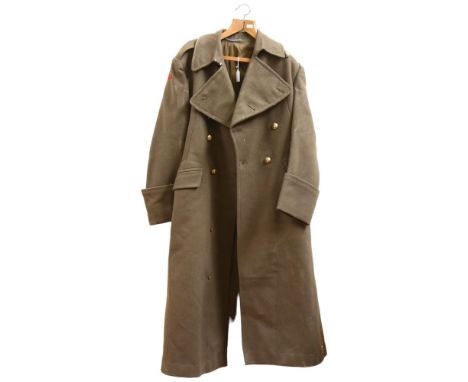 A World War II Period olive green Army great coat, with King's Own Scottish Borders buttons 