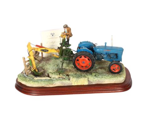 Border Fine Arts sculpture, depicting a man with digger and tractor, on wooden plinth, limited edition 1074/2003, L38cm 