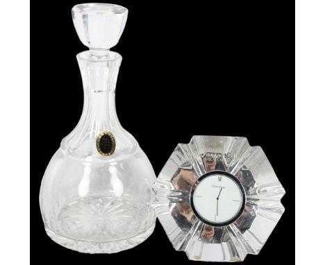 An Orrefors glass table clock, inscribed "Thank you from the leading hotels of the world ltd", and an Orrefors lead glass han