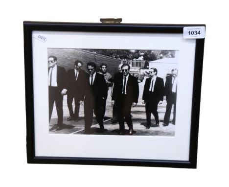 A black and white print depicting stars of the film Reservoir Dogs, framed 