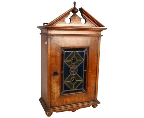 Edwardian oak table-top cabinet, with shelf and drawer-fitted interior, and stained glass panel to the door, H59cm 