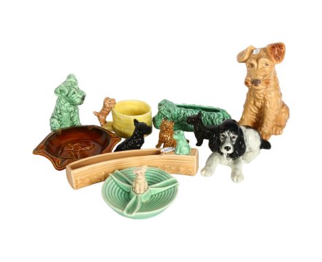 A shelf of Sylvac dog ornaments 