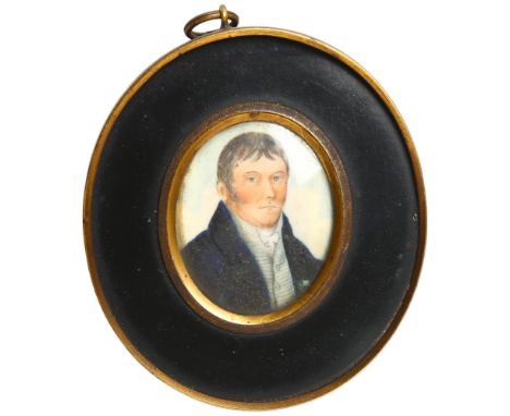 A 19th century oval miniature, watercolour on ivory panel, portrait of a gentleman, 10cm x 9.5cm.&nbsp;This item has been reg