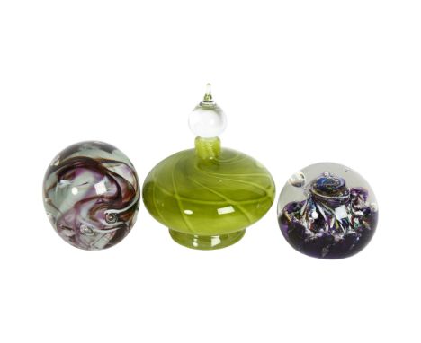 A Dockyard Glassworks green glass scent bottle and stopper, a Caithness Myriad paperweight, boxed, and another 
