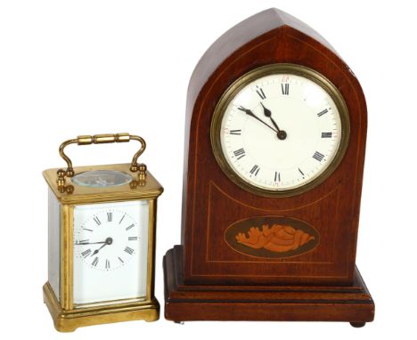 A brass carriage clock, and an Edwardian inlaid lancet-top mantel clock, 22cm 
