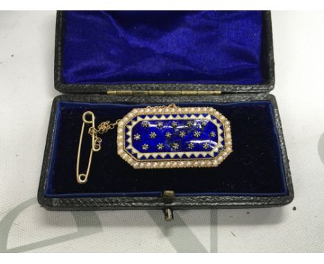 A gold 19th century enamel brooch set with diamond chips. (Unmarked).