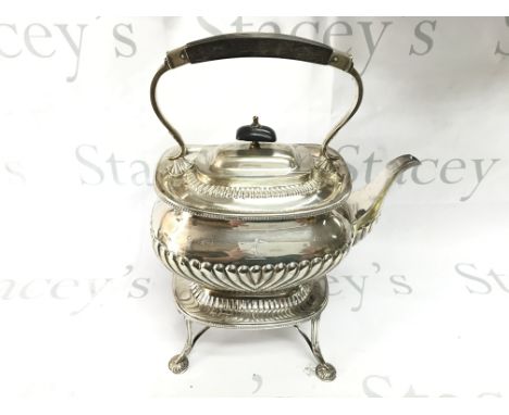 A silver kettle on stand with London hallmarks circa 1897. 1430g