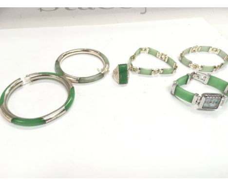 A mixed collection of silver and jade jewellery including bracelets, ring and a watch. Postage category A